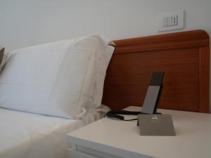 Postel nebo postele na pokoji v ubytování Hotel Regal