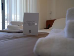 Postel nebo postele na pokoji v ubytování Hotel Regal