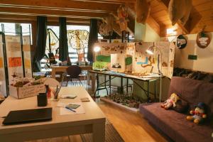 a living room with a couch and a table at Caserón Baruca in Bielsa
