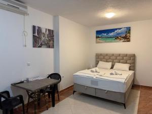 Voodi või voodid majutusasutuse Apartmani Hadžić toas