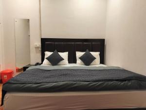 Postel nebo postele na pokoji v ubytování The Kishan's Nest + 14 fotografií