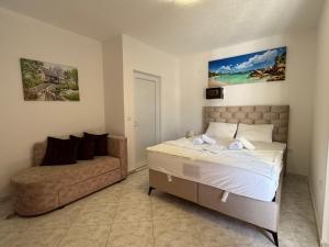 Voodi või voodid majutusasutuse Apartmani Hadžić toas