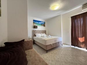 Voodi või voodid majutusasutuse Apartmani Hadžić toas