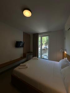 Serenity In客房内的一张或多张床位