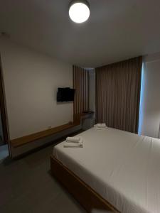 Serenity In客房内的一张或多张床位