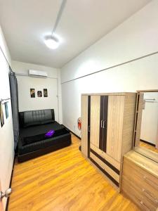 TV/trung tâm giải trí tại KW HOMESTAY CASA UNO APT Fully Aircond 3 Bedroom