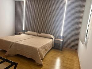 Postel nebo postele na pokoji v ubytování TCH Hotel
