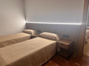Postel nebo postele na pokoji v ubytování TCH Hotel