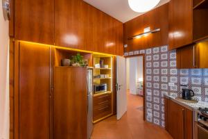 A kitchen or kitchenette at Le Residenze a Firenze - Residenza Covoni Apartment in the historical center of Florence