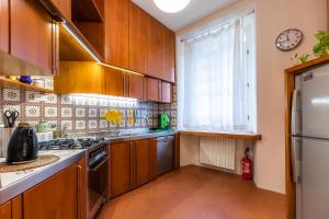 A kitchen or kitchenette at Le Residenze a Firenze - Residenza Covoni Apartment in the historical center of Florence