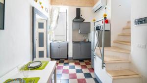 Kuchyňa alebo kuchynka v ubytovaní Maison Greta by Rentbeat