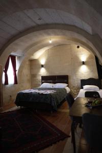 Postel nebo postele na pokoji v ubytování Bella Vista Stone House