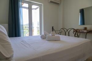 Ένα ή περισσότερα κρεβάτια σε δωμάτιο στο Oriana House
