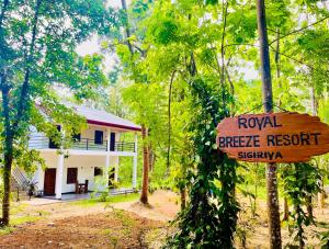 a sign that reads royal bicycle resort sigiriya in front of a house at Royal Breeze Resort Sigiriya in Sigiriya