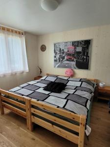 a bedroom with a large bed in a room at Appartamento Vacanza 2 locali in Quinto