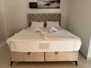 Voodi või voodid majutusasutuse Apartmani Hadžić toas