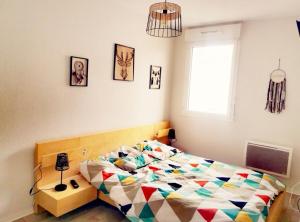 Ένα ή περισσότερα κρεβάτια σε δωμάτιο στο Le Mimi'Zen +29 φωτογραφίες