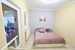 Un pat sau paturi într-o cameră la Penthouse View - FLH +33 fotografii