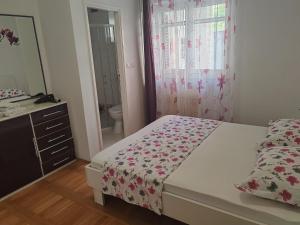 Postel nebo postele na pokoji v ubytování Apartment Eva