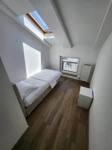 Letto o letti in una camera di New Lux