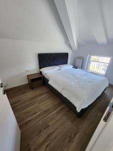 Postel nebo postele na pokoji v ubytování New Lux
