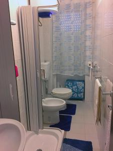 Kylpyhuone majoituspaikassa Caricia