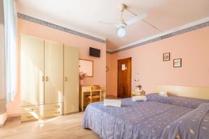 Postel nebo postele na pokoji v ubytování Hotel Marnie