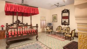 Postel nebo postele na pokoji v ubytování Hotel Bissau Palace