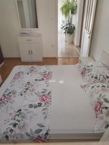 Postel nebo postele na pokoji v ubytování Apartment Eva