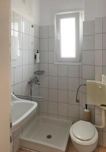 Koupelna v ubytování Hotel Europe Korinos + 15 fotografií