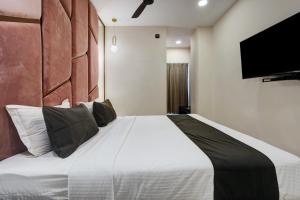 Postel nebo postele na pokoji v ubytování Astra Hotels & Suites - Koramangala