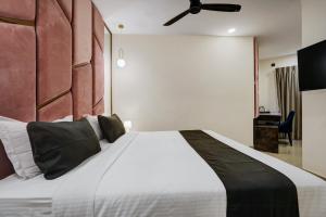 Postel nebo postele na pokoji v ubytování Astra Hotels & Suites - Koramangala