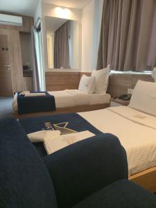 Mateus Hotel & Pool客房内的一张或多张床位
