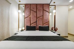 Postel nebo postele na pokoji v ubytování Astra Hotels & Suites - Koramangala
