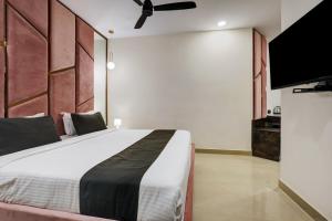 TV a/nebo společenská místnost v ubytování Astra Hotels & Suites - Koramangala