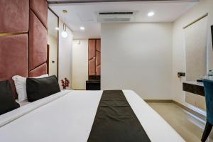 Postel nebo postele na pokoji v ubytování Astra Hotels & Suites - Koramangala