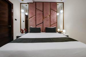 Postel nebo postele na pokoji v ubytování Astra Hotels & Suites - Koramangala