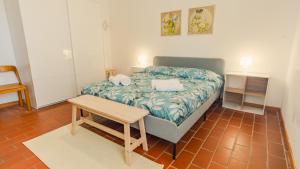 Ένα ή περισσότερα κρεβάτια σε δωμάτιο στο Residence Casa Adriana