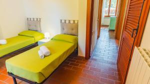 Ένα ή περισσότερα κρεβάτια σε δωμάτιο στο Residence Casa Adriana +40 φωτογραφίες