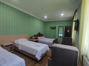 Postel nebo postele na pokoji v ubytování Hotel VENUS