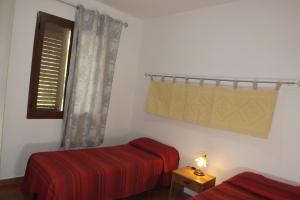 Кровать или кровати в номере Yellon House