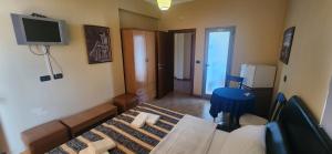 Телевізор і / або розважальний центр в Hotel Vlora