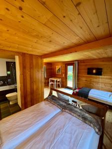 Voodi või voodid majutusasutuse Le Hameau des Biquettes toas