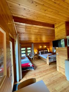 Voodi või voodid majutusasutuse Le Hameau des Biquettes toas