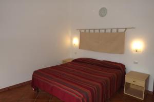 Кровать или кровати в номере Yellon House