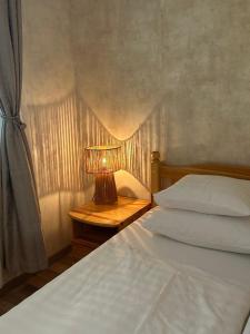 Postel nebo postele na pokoji v ubytování Mirabell apartman