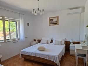 Postel nebo postele na pokoji v ubytování Giovanna - spacious lovely apartment