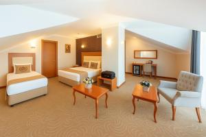 Ένα ή περισσότερα κρεβάτια σε δωμάτιο στο Grand Hotel Avcilar +32 φωτογραφίες