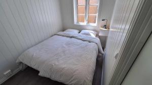 Postel nebo postele na pokoji v ubytování Apartment in Tønsberg Sentrum