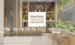 eine Darstellung einer Bar mit Hockern und Weinflaschen in der Unterkunft Slaviero Prime Campo Grande in Campo Grande